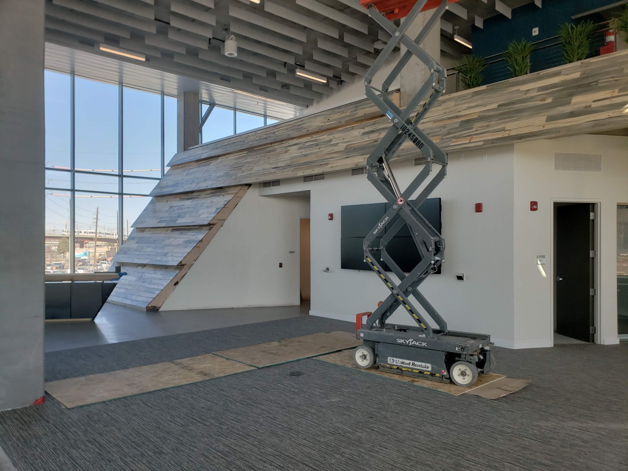 Beetle-kill wood wall installation