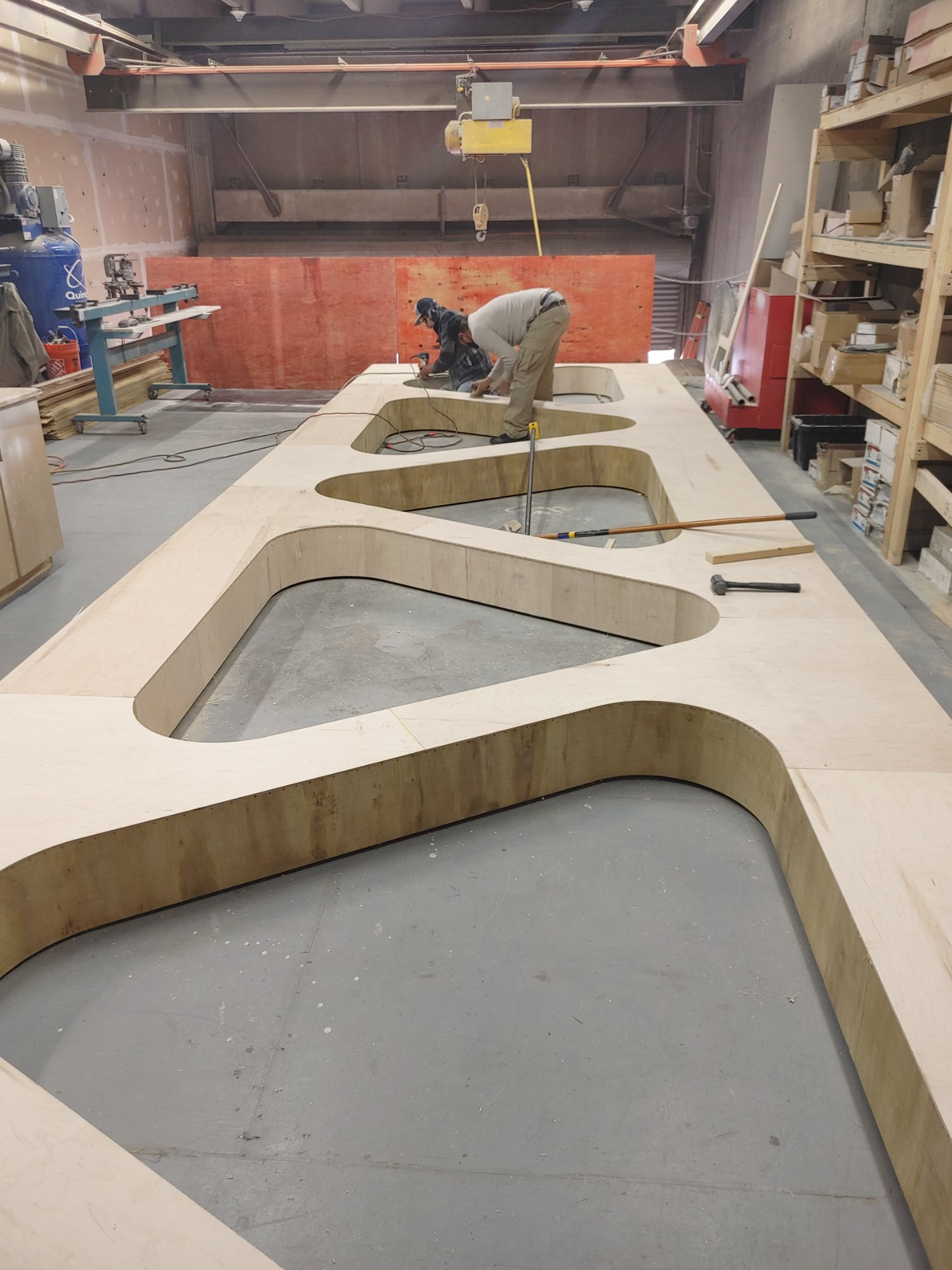 Wall system fabrication in shop